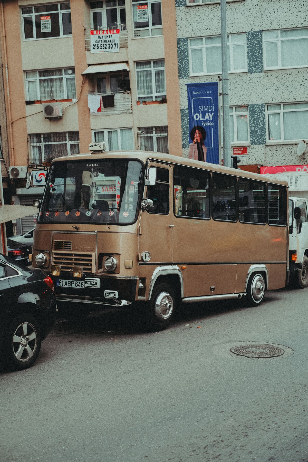 Shared dolmuş minibus on a coastal road in Turkey