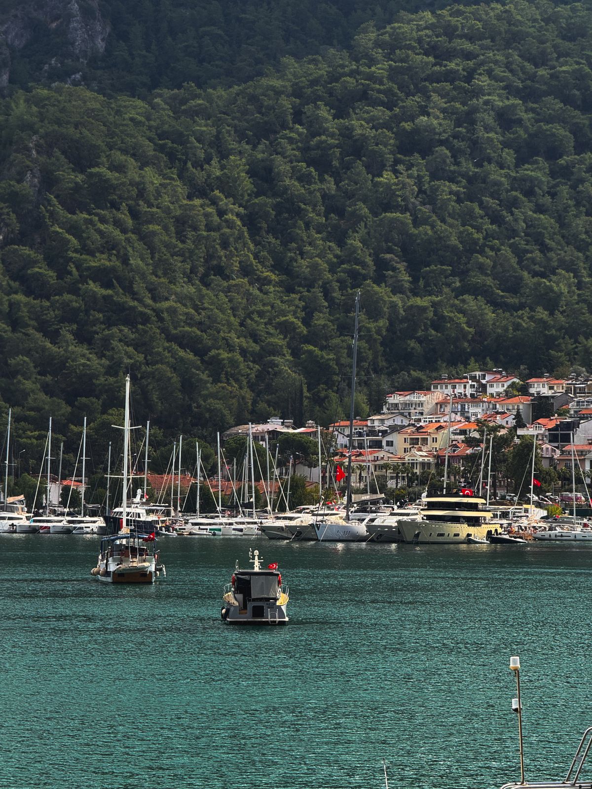 Fethiye harbour with moored boats and hills behind